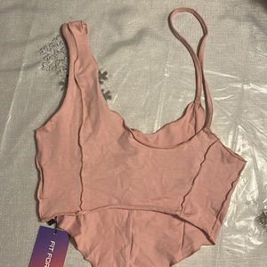 I am selling a shirt, Color is pink ,Brand is SHEIN, Size small.